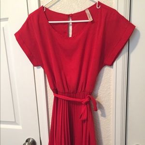Red pleated dress